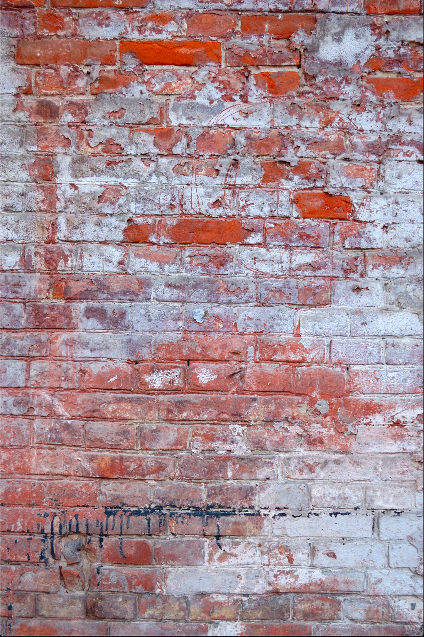 Weathered Red Brick Wall